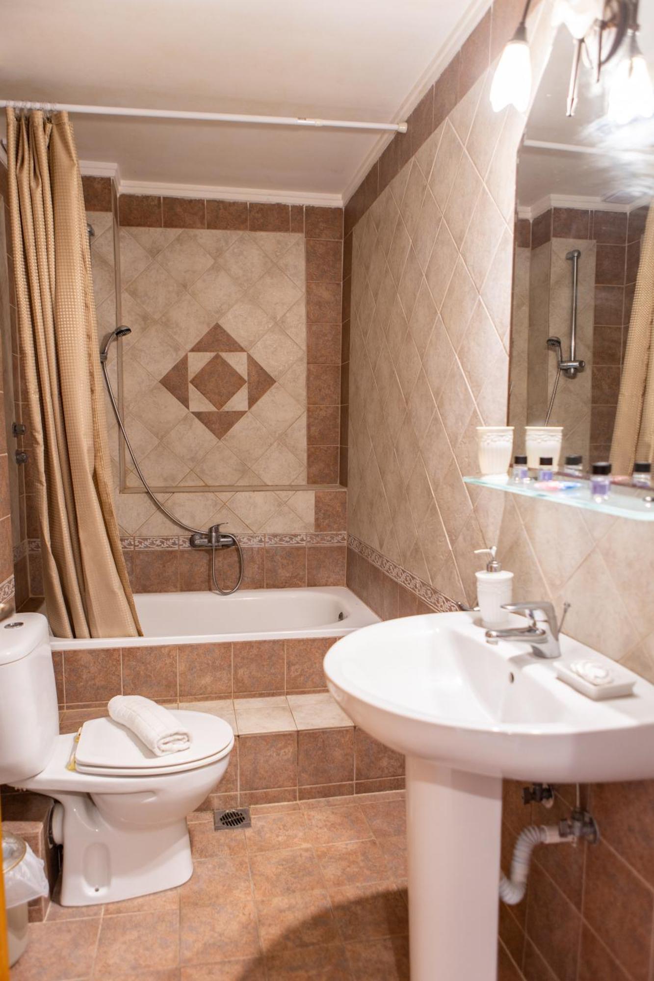 Xenia Palace Luxury Apartments Неа-Врасна Экстерьер фото